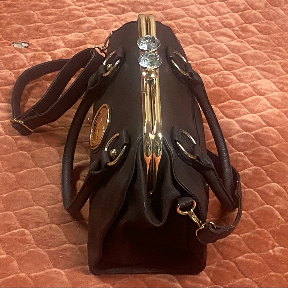 Micheal kor’s body-cross pure & a hand held!